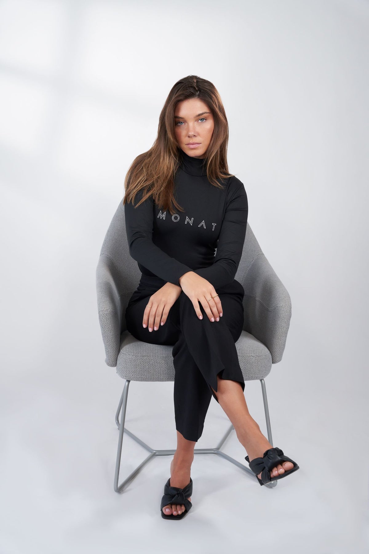 MONAT LONG SLEEVE BLACK BODYSUIT