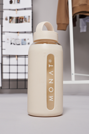 MONAT Glass Water Bottle With Interchangeable Lids - Ivory