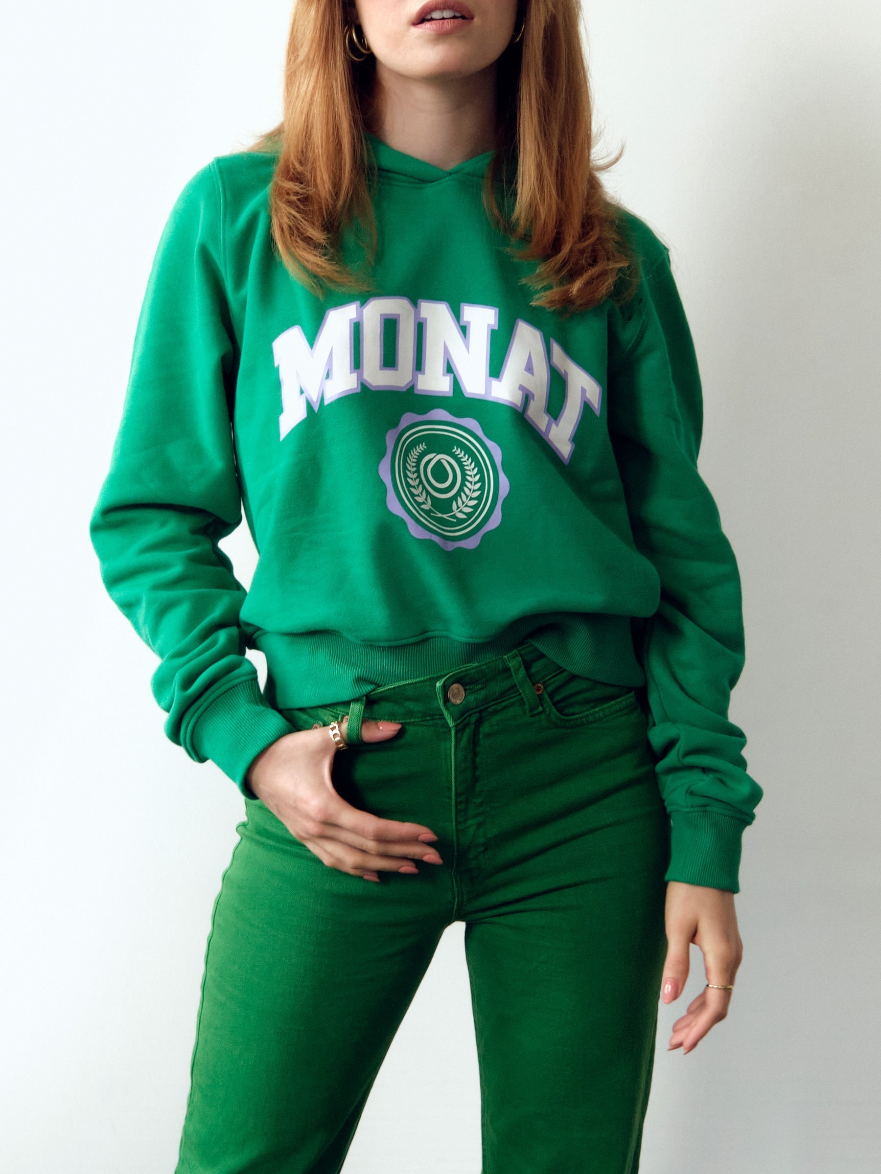MONAT Oil Drop Cropped Crest Hoodie- Green